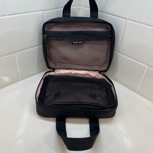 Mary Kay cosmetic bag in satin black and pink. Removable inner bag.